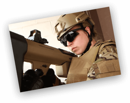 Photo of Military official holding Battelle's DroneDefender