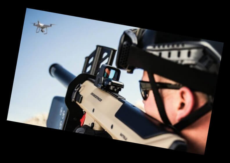 Alternate Photo of Military official holding Battelle's DroneDefender