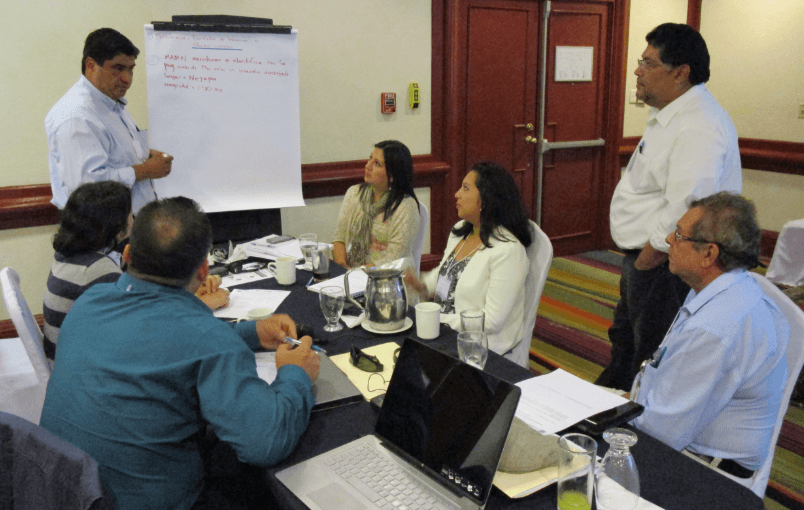 Air-Quality-Case-Study3 Decision makers from various sectors of government in El Salvador participate in a group exercise during a workshop facilitated by Battelle.