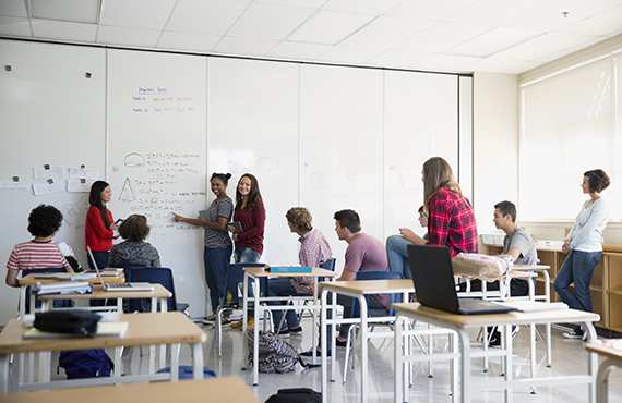 College Ready Programs Group of students at white board.