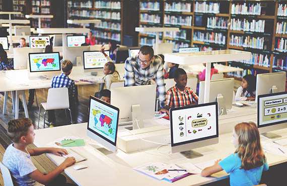 STEM Grants Female student in library.