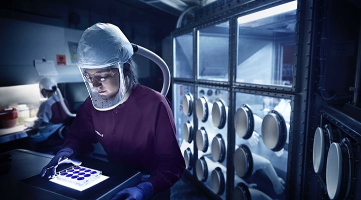 Explore-Careers-at-Battelle Photo: Battelle epidemiologist workign in Biosaftey Level 3 lab