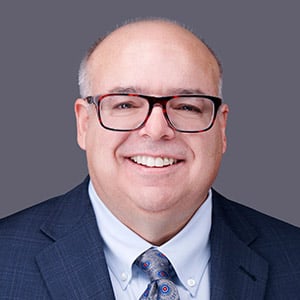 alt= headshot of Executive Vice President of National Laboratory Management & Operations for Battelle Juan Alvarez