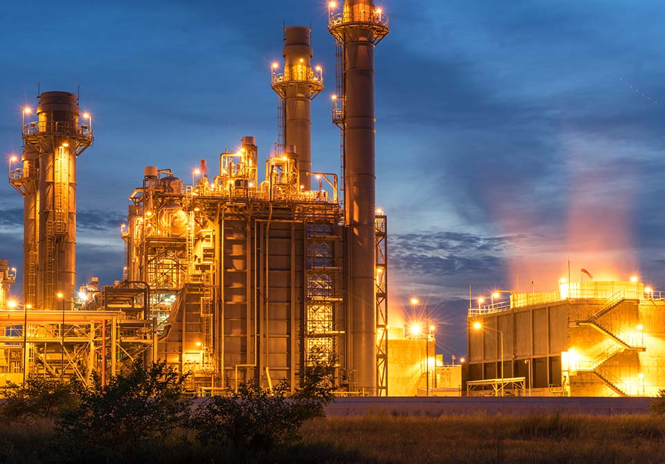 Photo: a power plant at sunset