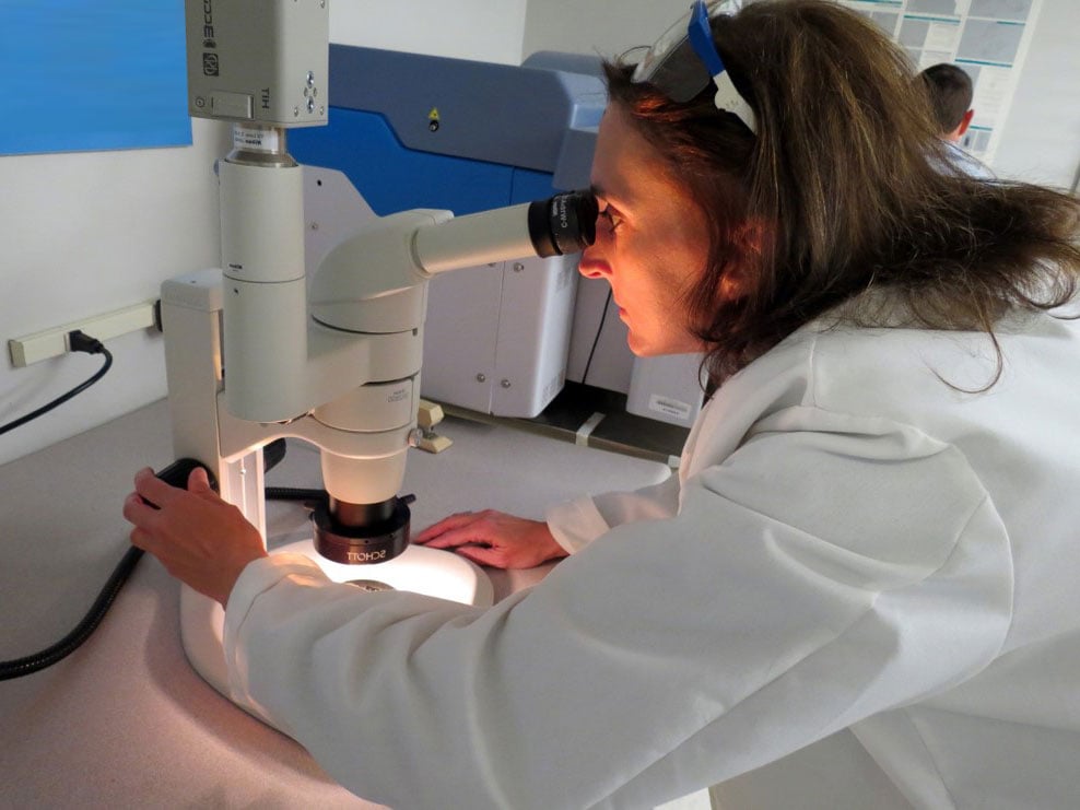 Stay-Connected-Call-out Photo: Battelle Technical Fellow Amy Heintz working in lab