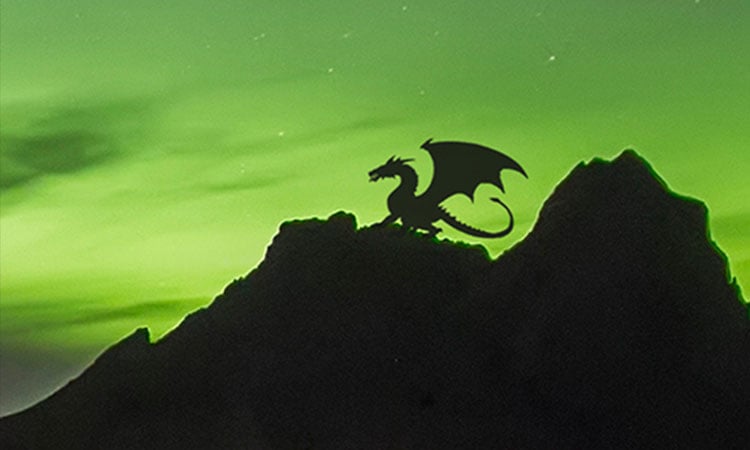 alt=illustration of a dragon on top of a mountain
