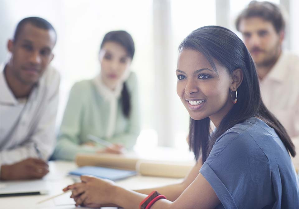 Supplier Diversity call out Photo: group of people in a meeting in an office