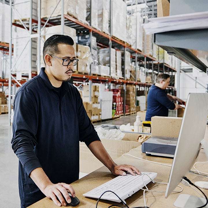 Battelle Supplier Photo: Man working for a Battelle Supplier inventorying medical devices
