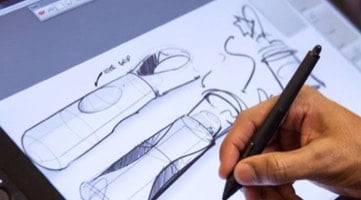human-factors-industrial-design-expertise-thumb Photo: Designer drawing mockups on paper.