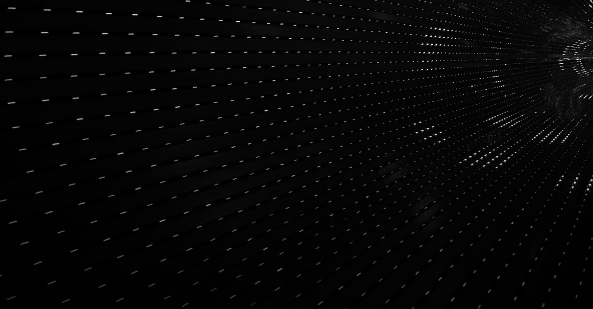 alt= black background with white specs throughout