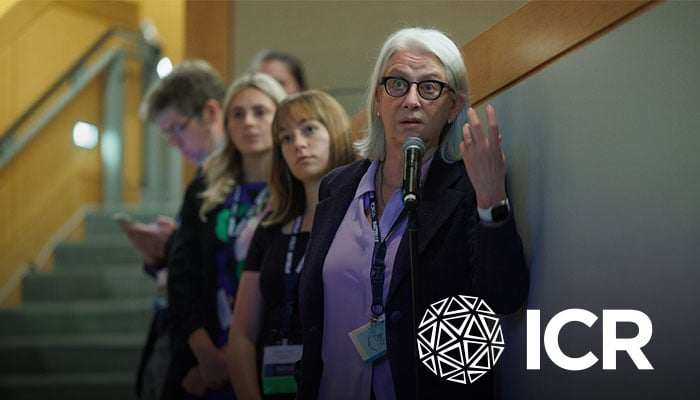 alt= icr attendees waiting to ask a question during the innovations in climate resilience conference