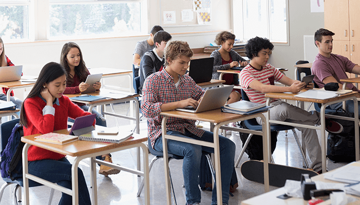 alt= a group of stem students in a crowded classroom