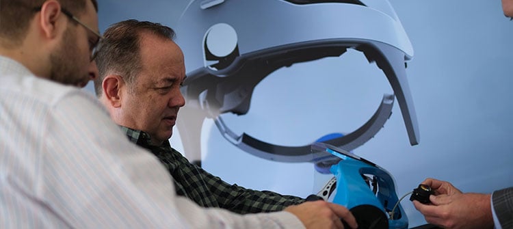 hcd-team-product-execution-1 alt = hcd team members working on the zimmer surgical helmet system