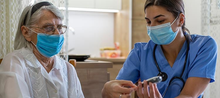proven-results-2 alt= a nurse using an injector on a patient in their home