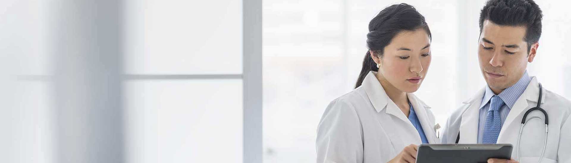 Photo: Doctors studying a report