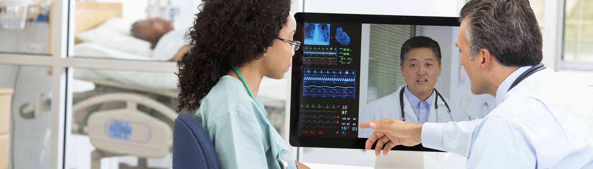 Photo: Doctors Analyzing Medical Records