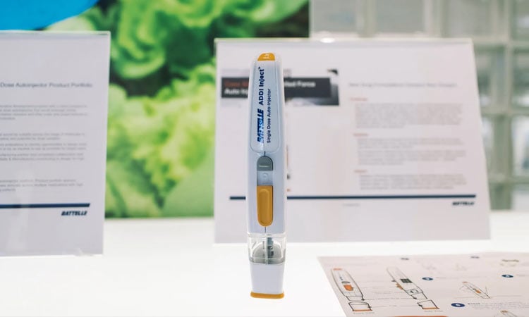 alt=display of the battelle adoi inject, single dose auto-injector