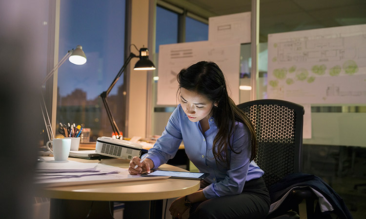 Photo: Employee working at table