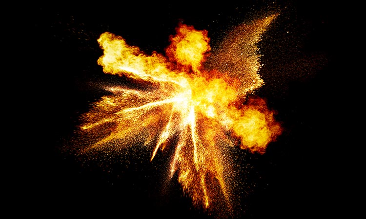 Photo: explosion in mid-air on a black background