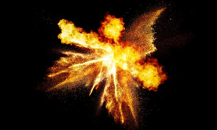 Photo: explosion in mid-air on a black background