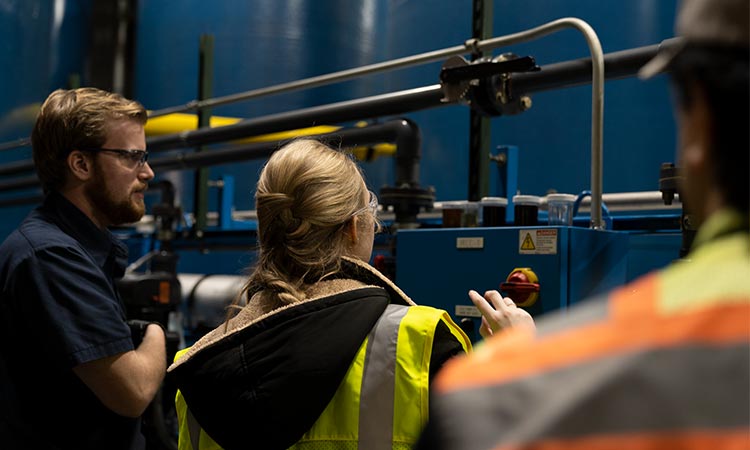 Photo: Battelle pfas annihilator technicians working on a mobile unit