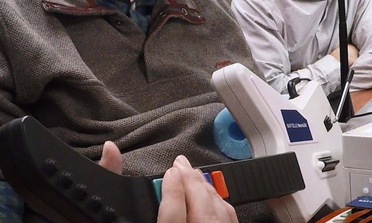 Photo: Ian Burkhart playing a guitar-based video game