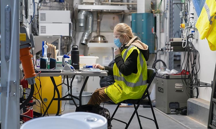 Photo: Battelle Environmental Engineer, Julia Stowe, logs leachate samples treated by Battelle’s Mobile PFAS Annihilator