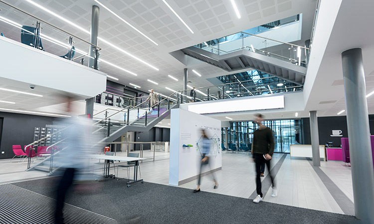 Photo: People walking in a corporate building