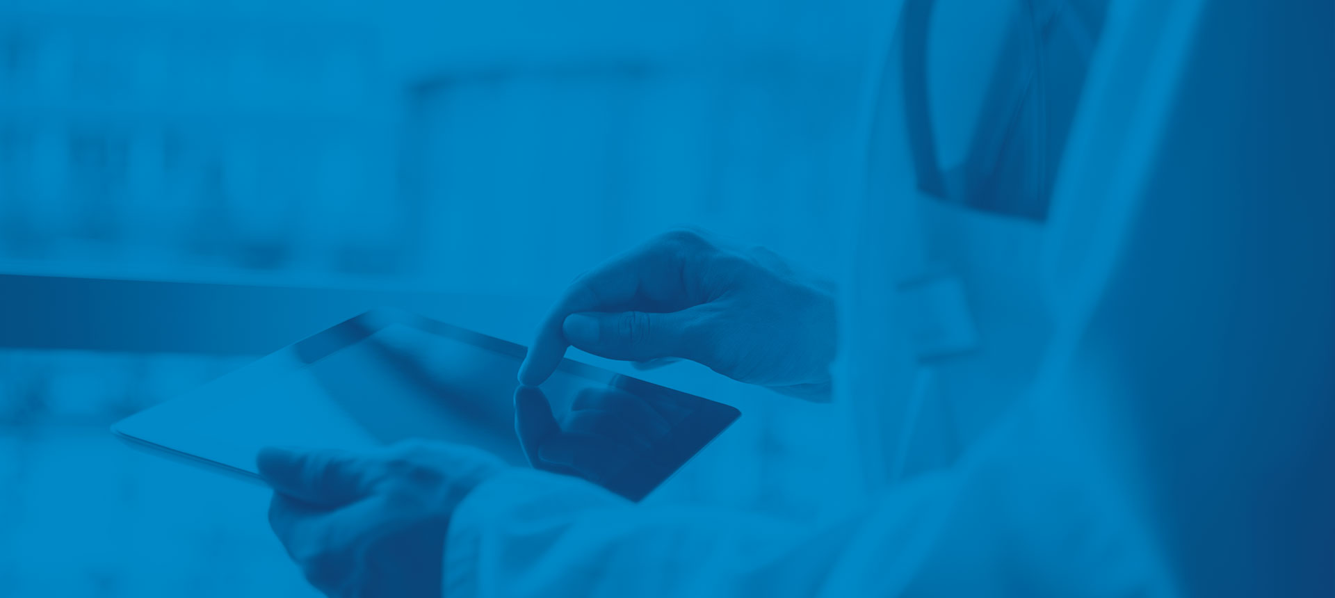 Photo: doctor working on a tablet