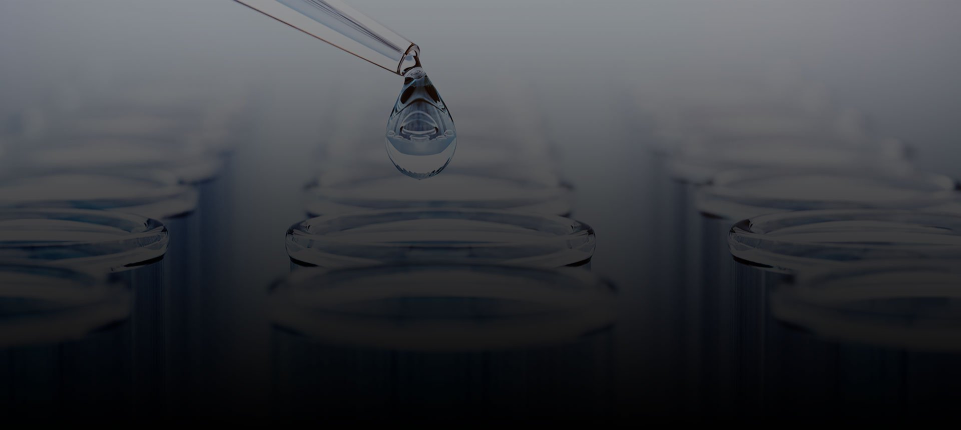 Image: PFAS-contaminated drinking water being added to a test tube in an accredited PFAS laboratory
