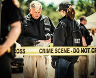 WAMU-MPS1 Police at a crime scene with an evidence bag