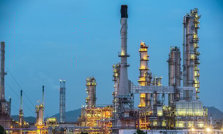 solving-the-storage-problem-featured Photo: Industrial plant at dusk