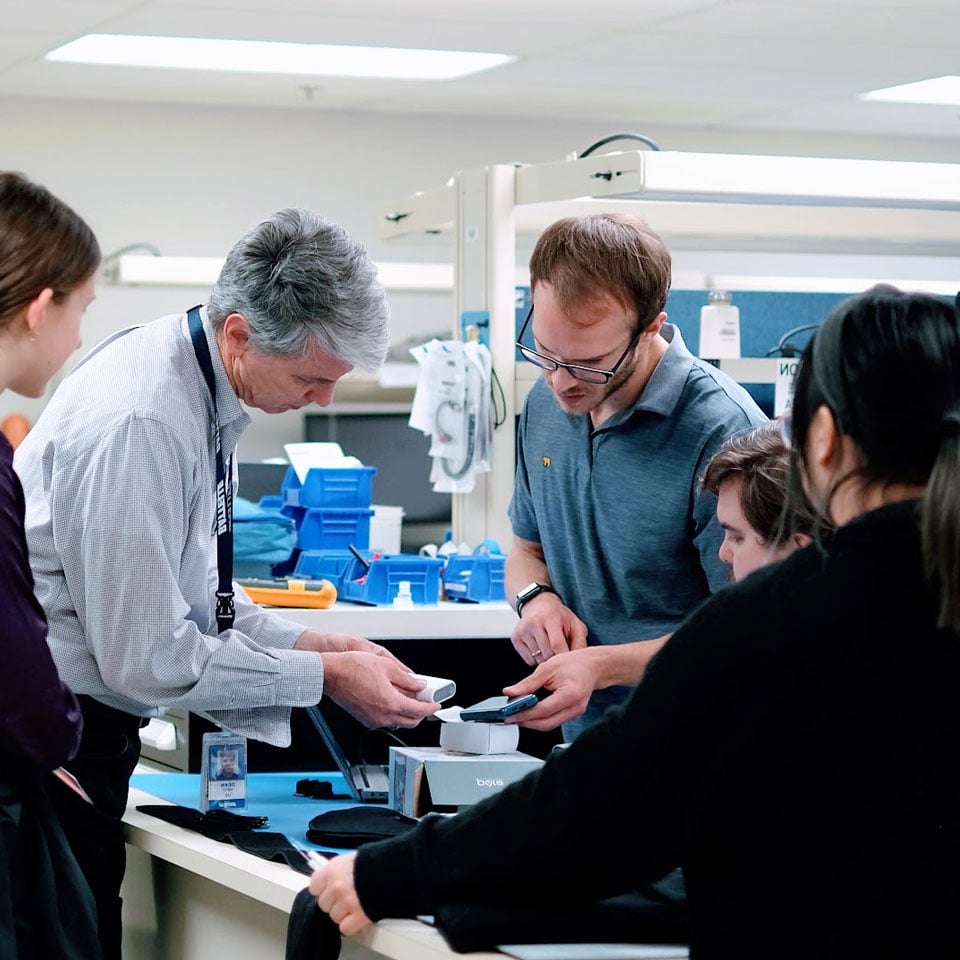 medical-devices-government-callout Image: Battelle medical device experts examining a new product
