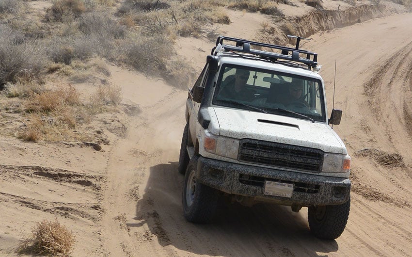 Photo: Reliable armored vehicle on a sand dune