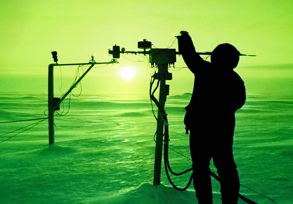 artic-impact-callout Photo: Battelle researcher working in an Arctic environment