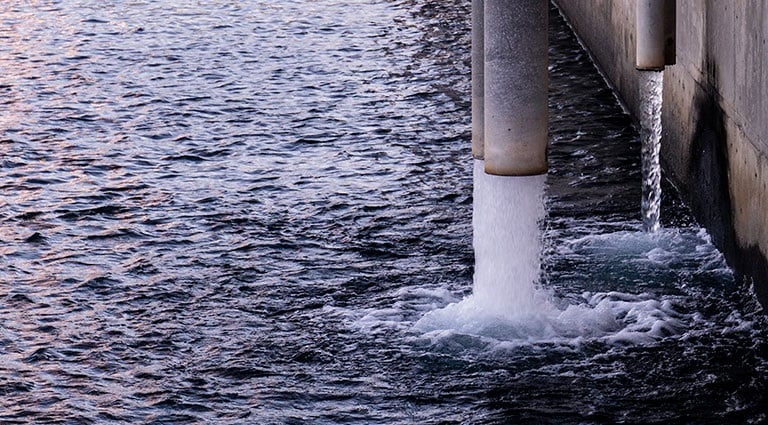 Image: Complex industrial wastewater flowing out of a pipe