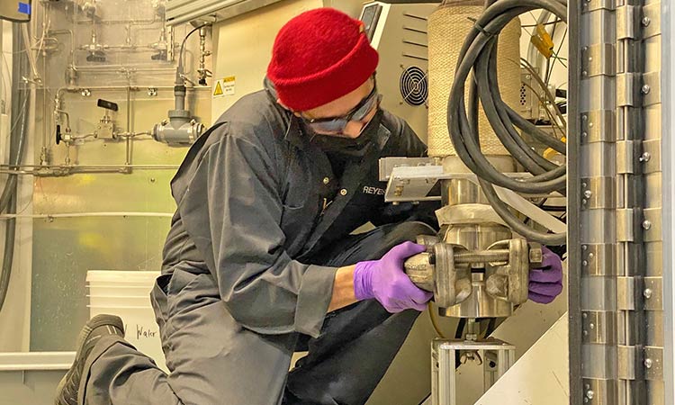 Photo: Battelle solver mark reyes working on the battelle pfas annihilator mobile unit