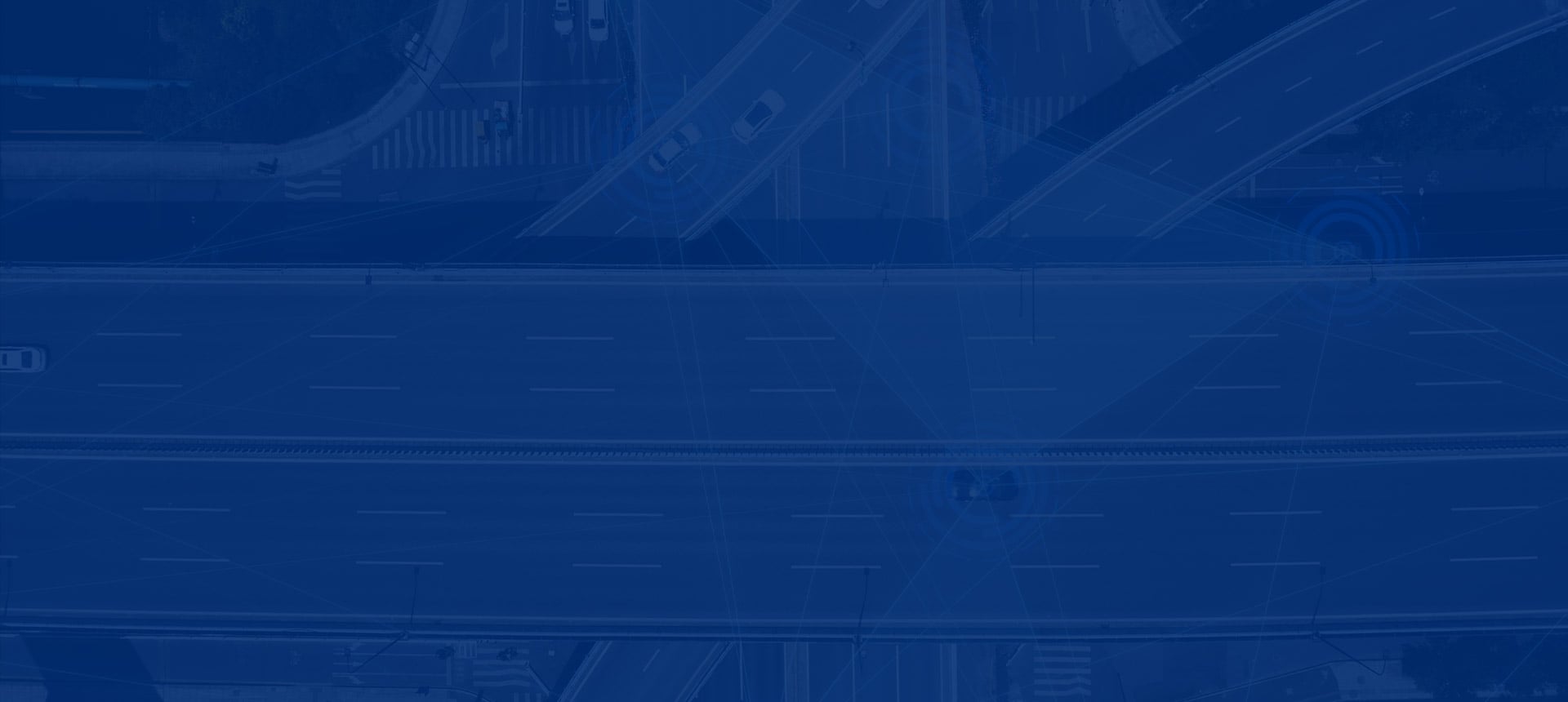 alt=a Smart highway with an overpass and cars that are digitally connections
