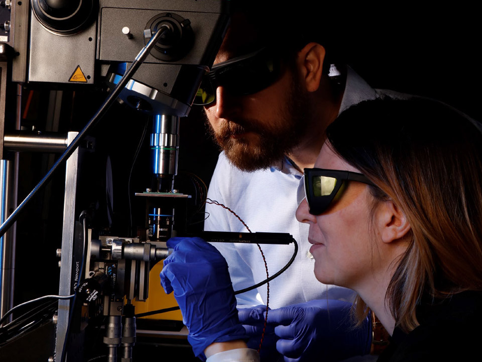 Photo: Lab technicians doing device characterization in the Battelle Microelectronics Assurance Laboratory