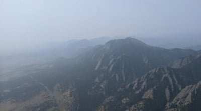 alt = landascape shot of a mountain range