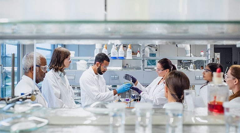 Image: Battelle experts in life sciences research lab