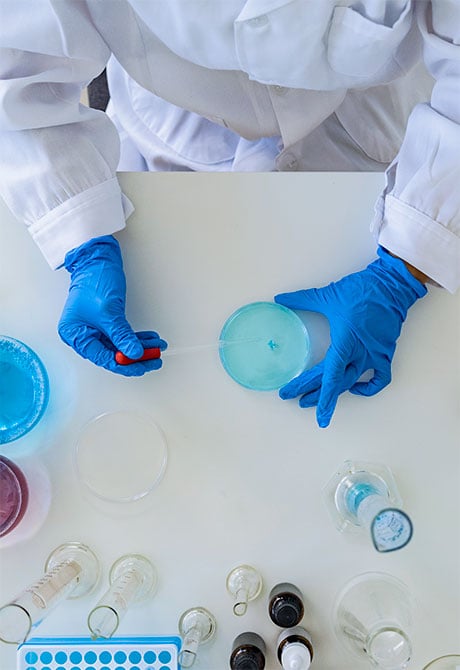 Image: Battelle PFAS replacement experts examining product components