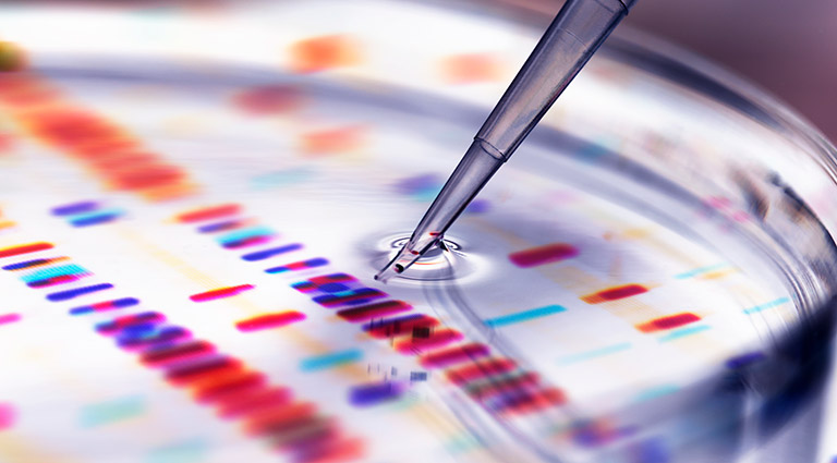 non-viral-gene-delivery-featured Photo: Battelle researcher using a pipette as part of a gene therapy process