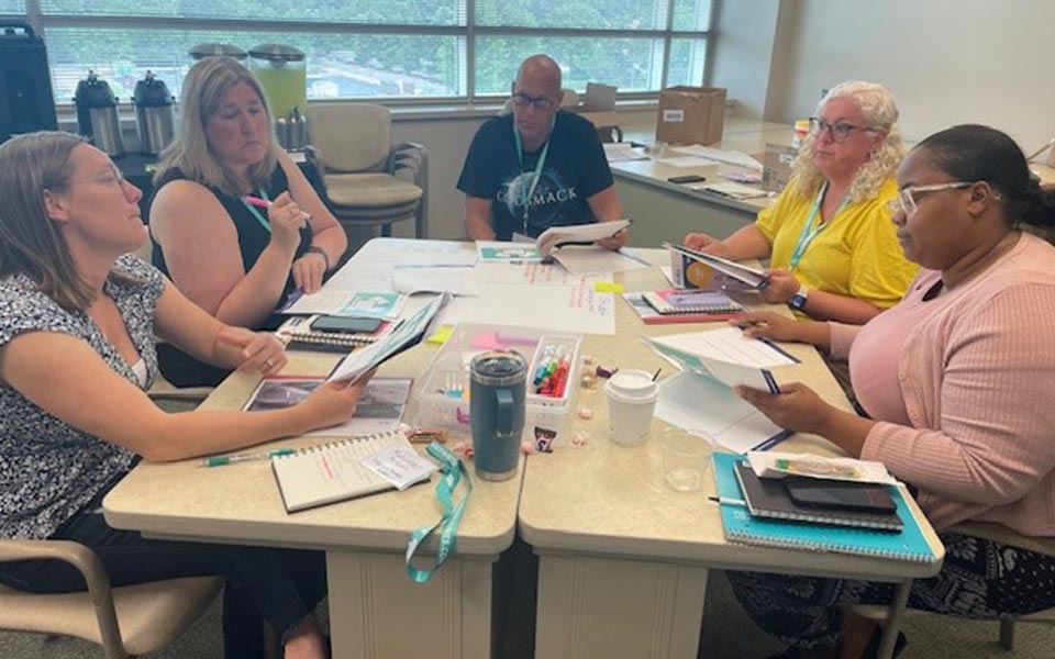 alt=teacher participating in a teacher academy workshop
