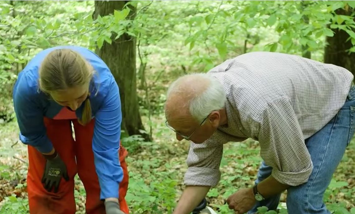 Neon Overview for Battelle Photo: Two site researchers in the woods