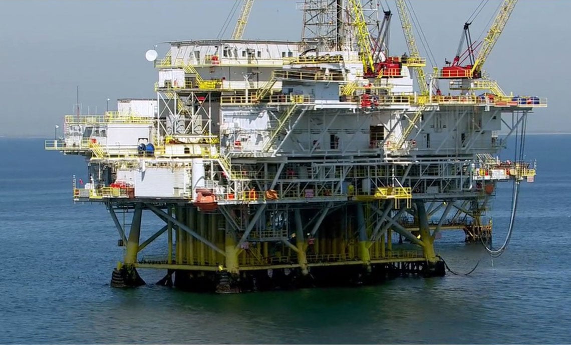 Oil and Gas Services at Battelle Photo: an oil rig in the middle of the ocean