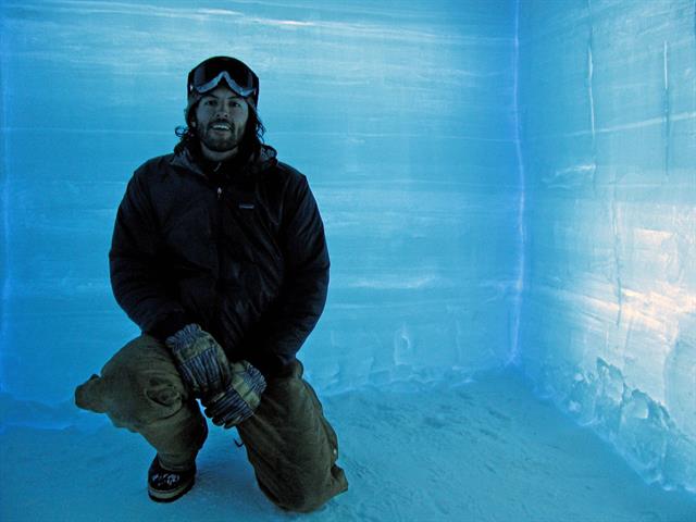 Photo: Battelle program manager Nick Romero in a snow pit in the artic